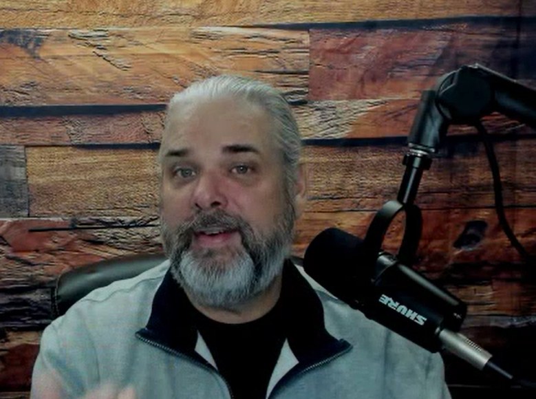 David L. Parker at the microphone recording the AttitudeShield podcast